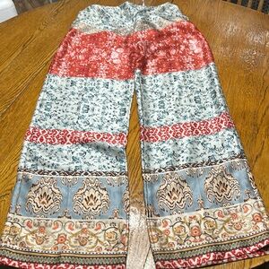 Zara floral print wide leg silky pants. Size Large.  As Is!  Cuts on waistband.